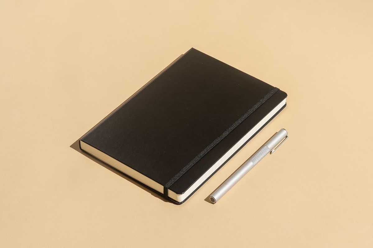 Leuchtturm1917 Hardcover Notebook with a pen next to it